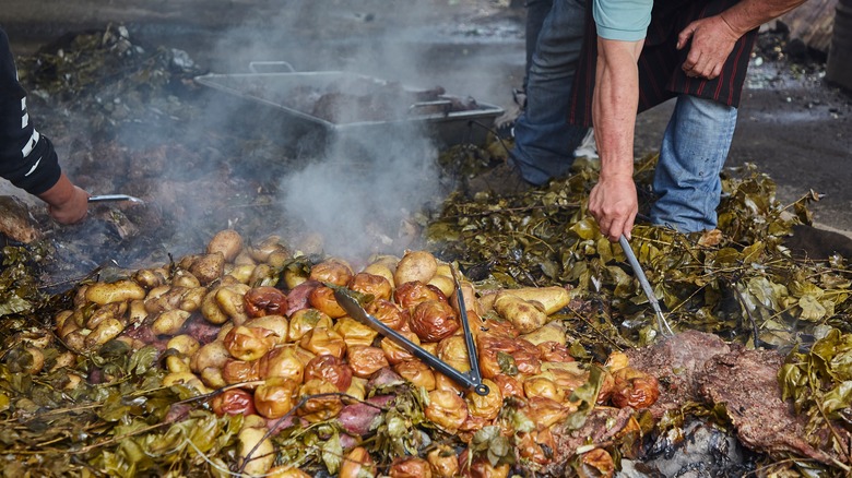 Food cooked in pit barbecue