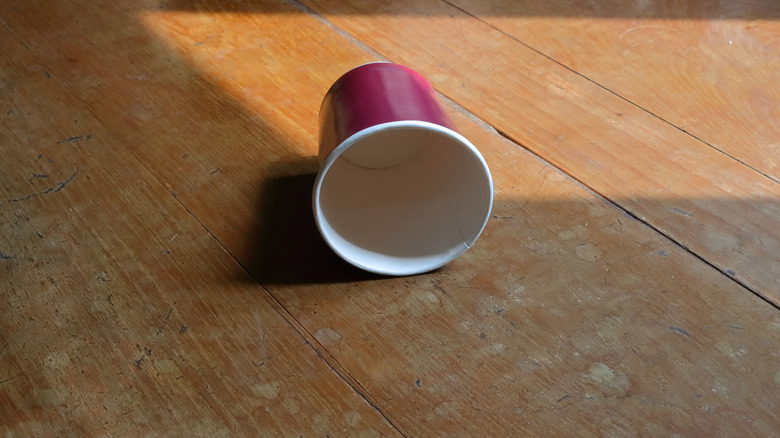 cup coated with polyurethane on table