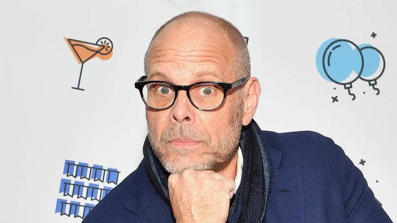 alton brown with festive background