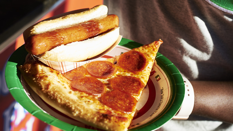 Hot dog and pizza slice