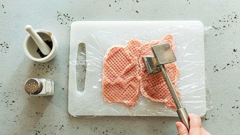 Pounded raw pork chops