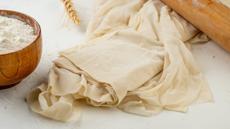 Puff pastry dough on a white table