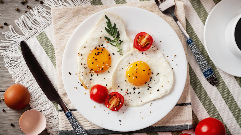 Fried eggs on a breakfast plate