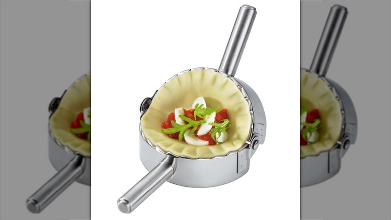 an empanada press