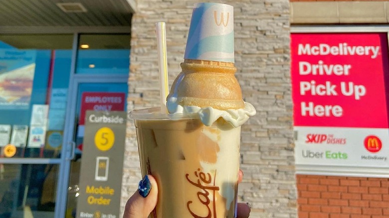A McBassett in front of a McDonald's