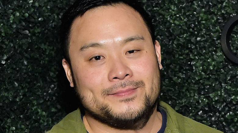 David Chang wearing green shirt