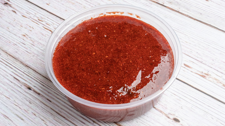 Watermelon with chamoy sauce and chili powder