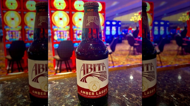 bottle of abita amber beer on bar in casino