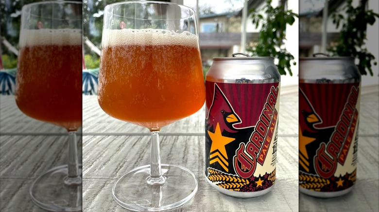 can and glass of cardinal pale ale on outside table