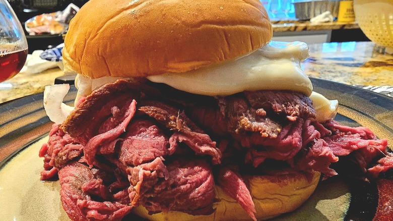 Pit beef sandwich on plate in restaurant