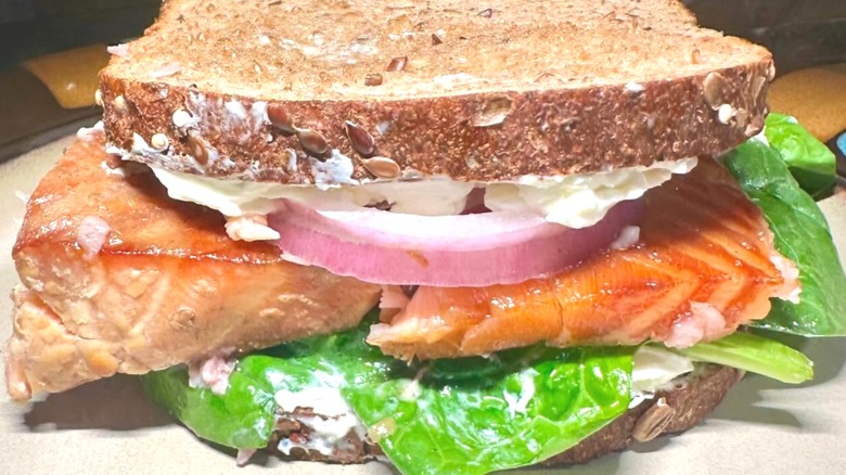 Close up of a smoked salmon sandwich