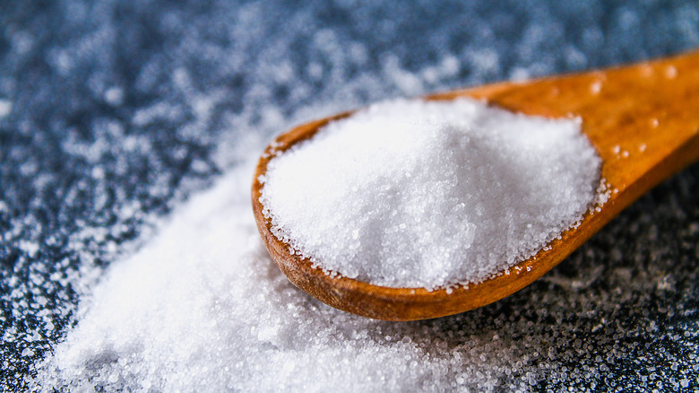 salt in a wooden spoon