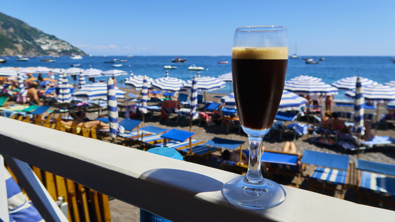 Shakerato on a railing by the beach