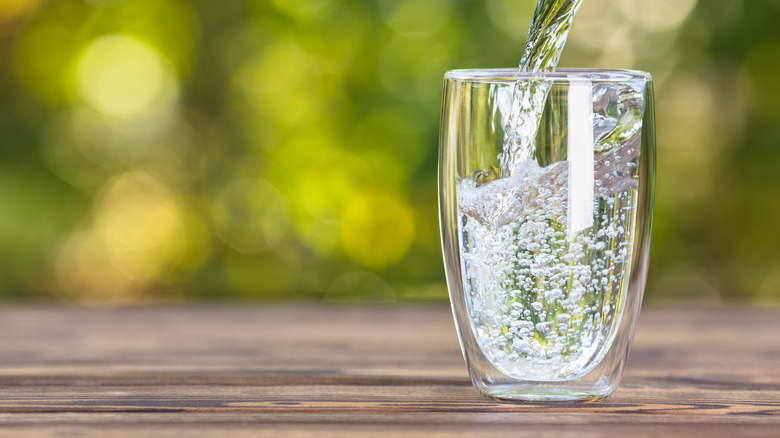 water poured in glass
