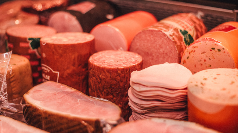 Various deli meats in loaves and slices