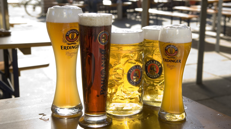 Glasses of beer on a table at an outdoor beer garden