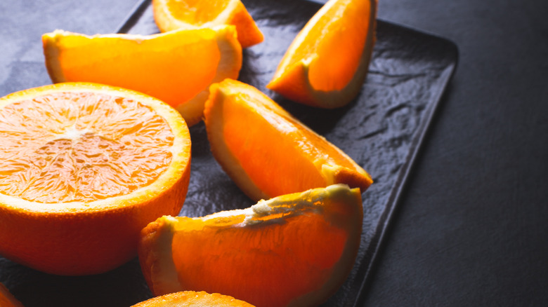 Orange wedges on a tray