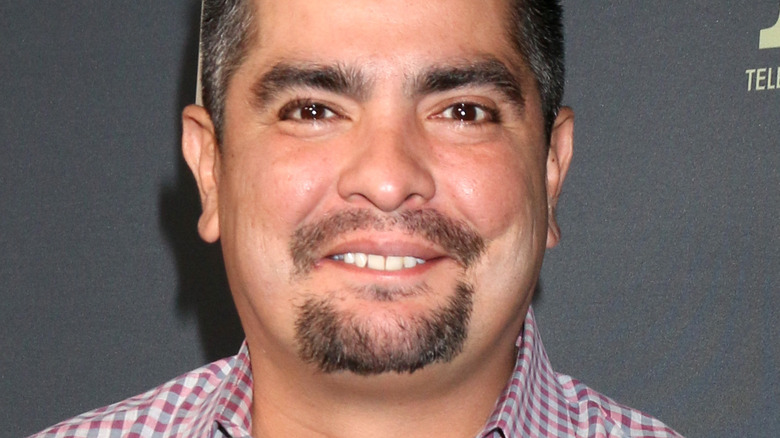 Aarón Sánchez with slight smile