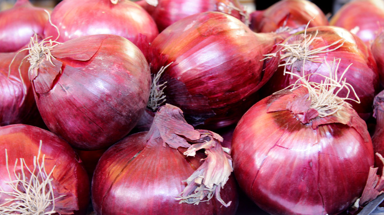 A pile of red onions