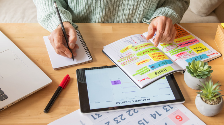 A person working on a home and shopping budget