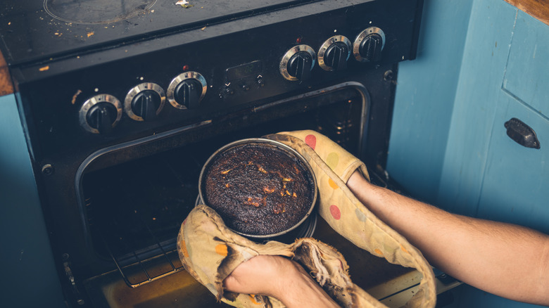Burnt cake removed from oven