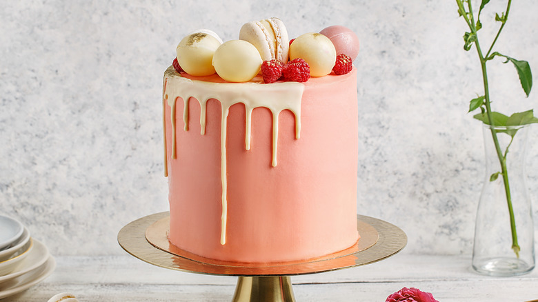 Pink cake on stand