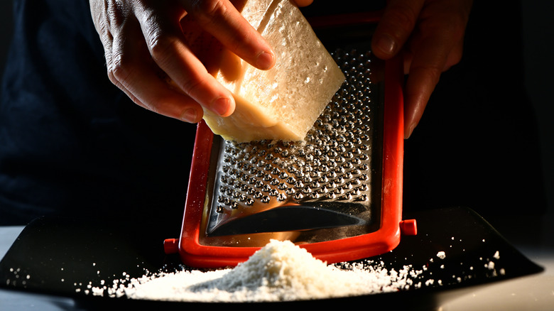 Hand grating Parmigiano Reggiano