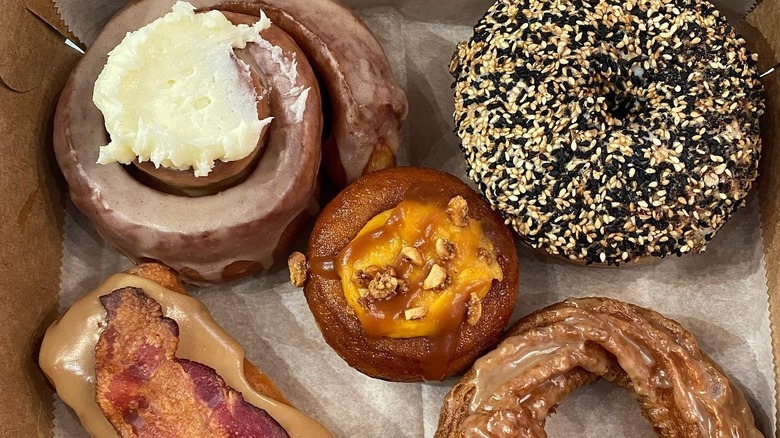 box of variously flavored donuts