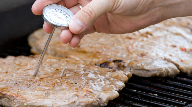 checking meat temperature