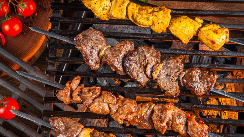 Meat skewers on a grill