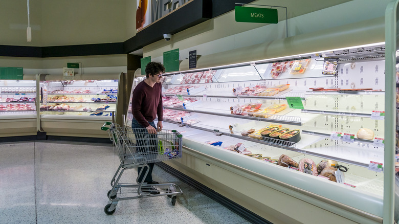 man shopping at Publix 