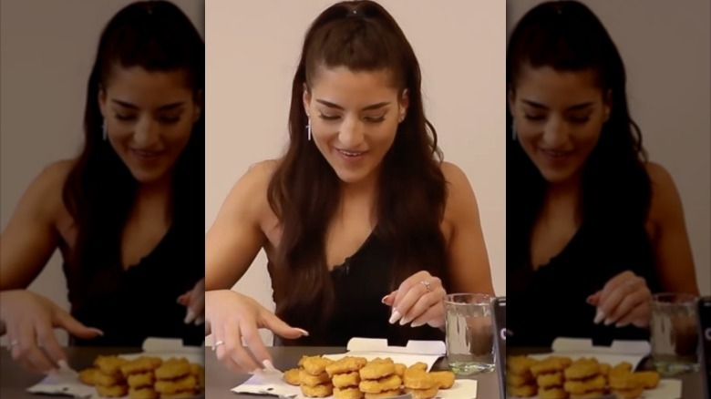 Leah Shutkever eating chicken nuggets
