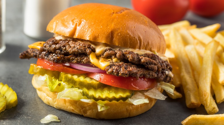 smash burger with French fries
