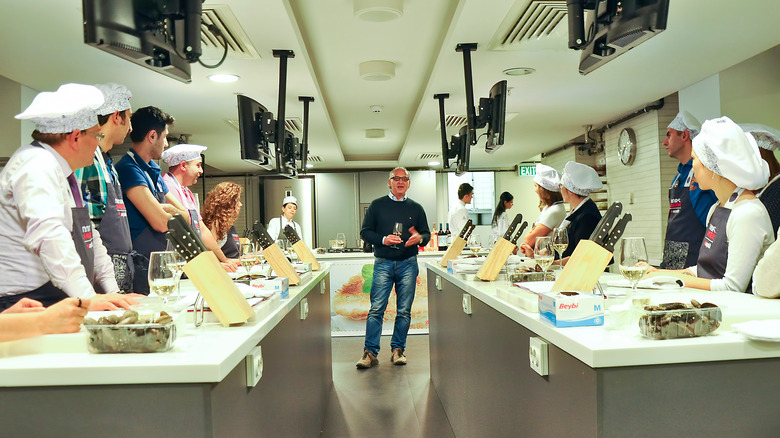 Culinary students attending a cooking class