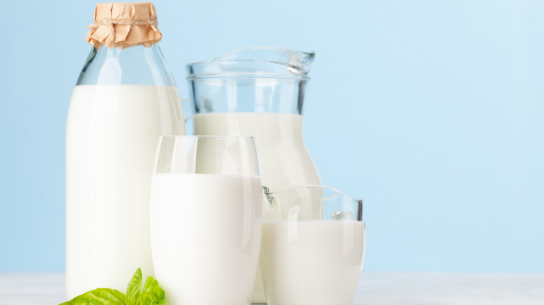 glass containers full of milk