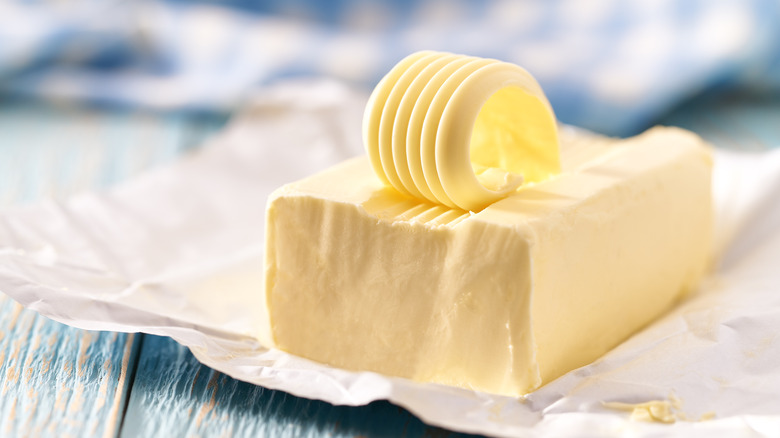 A curl of butter from the brick