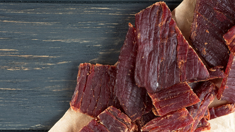 Beef jerky on wooden board