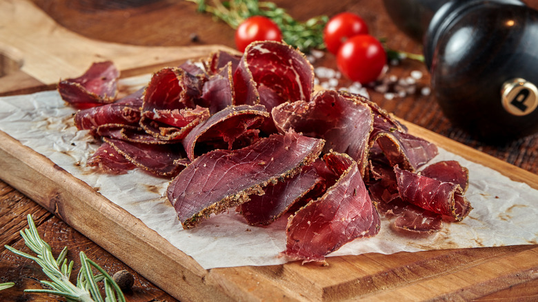 Beef jerky on wooden board