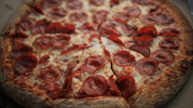 Pepperoni pizza with curly pepperoni