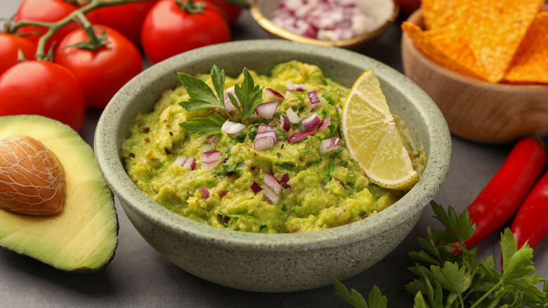 Guacamole in molcajete with chips
