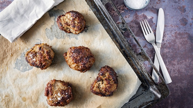 Cooked meatballs on parchment paper 