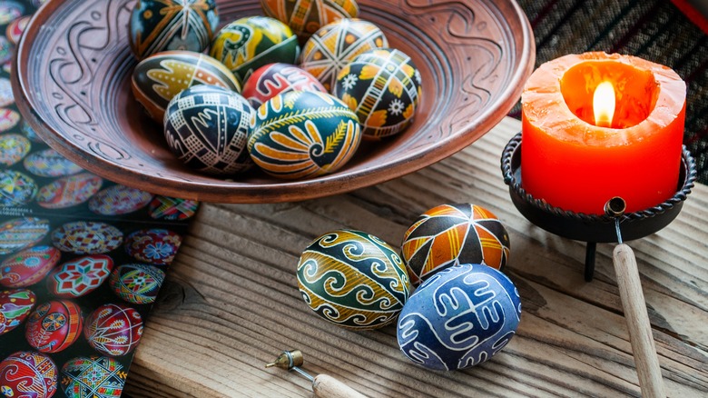 wax covered pysanky in bowl