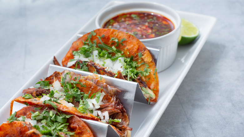 Birria tacos with consommé