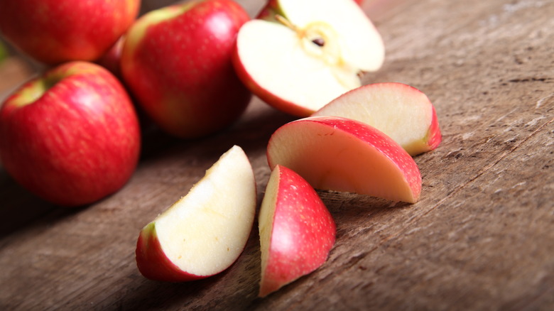 Apple slices on wood