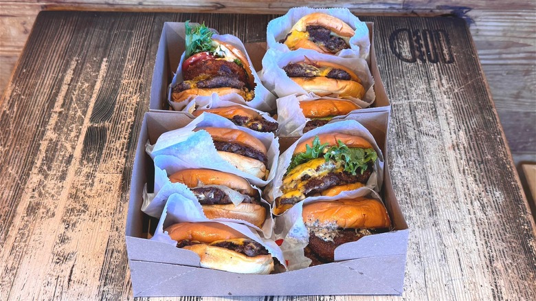 Shake Shack burgers on wooden table