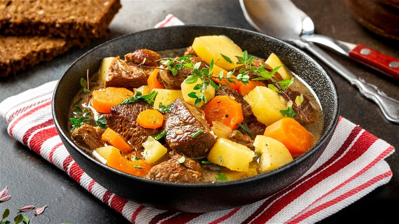 Beef stew on red striped napkin