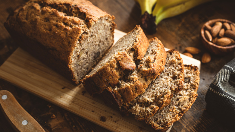 banana bread on wood cutting board