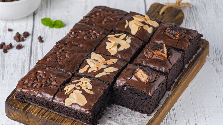 Tray of brownie squares with toppings