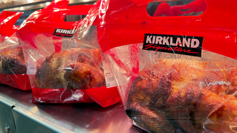 Kirkland Signature rotisserie chickens in their red bags