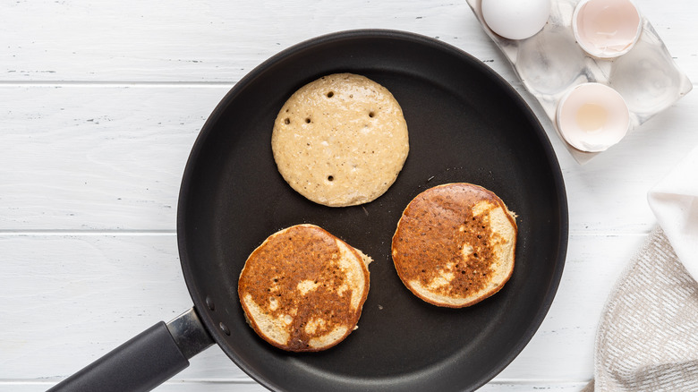 Pancakes cooking in pan 
